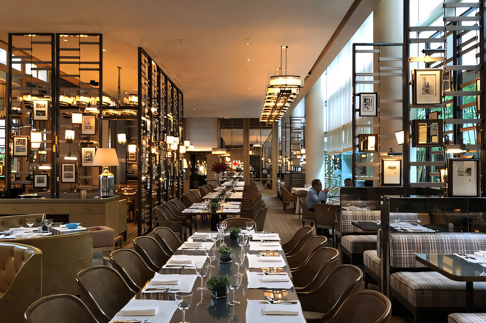 The long, elegant interior of a luxury hotel restaurant or tea room (reminiscent of The Ritz), featuring a long communal table, plush seating, and modern metallic shelving that separates the dining areas.