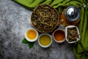 Thai Oolong Tea: Farmers hand-picking fresh oolong leaves in Mae Salong’s cool highlands.
