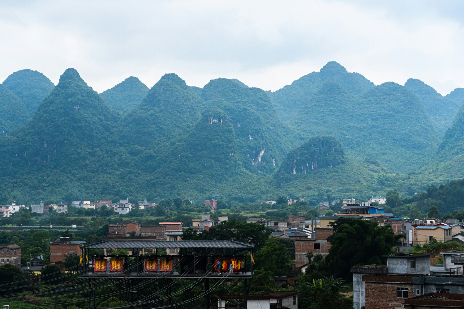 Best Park in SG: Ancient Fujian mountains, birthplace of Bai Hao Yin Zhen, wrapped in soft clouds.