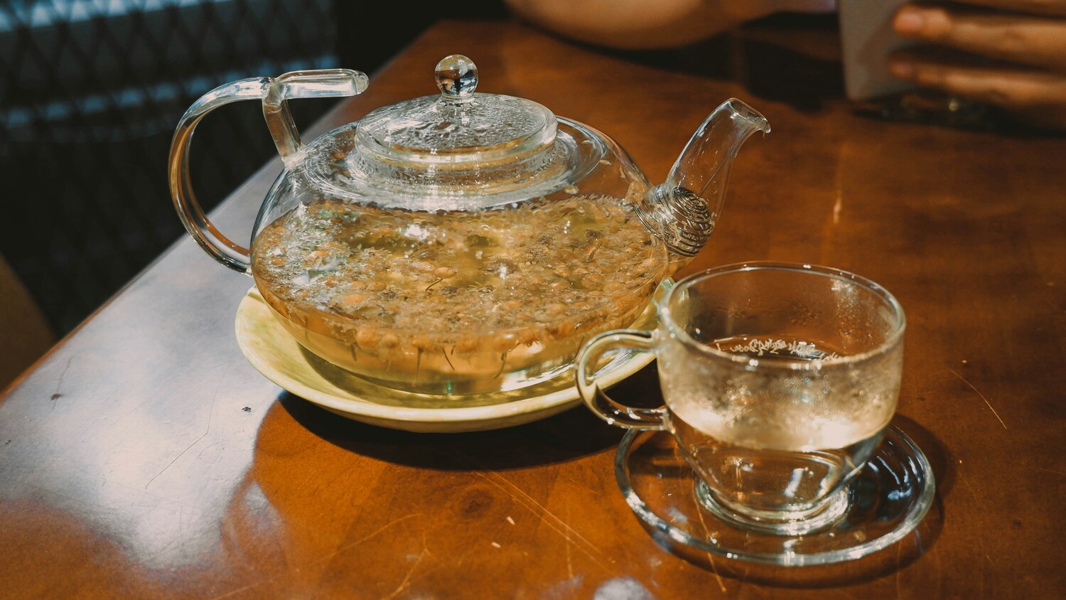 Best Park in SG: A teacup of Silver Needle white tea glowing with clarity, symbolising centuries of artistry.